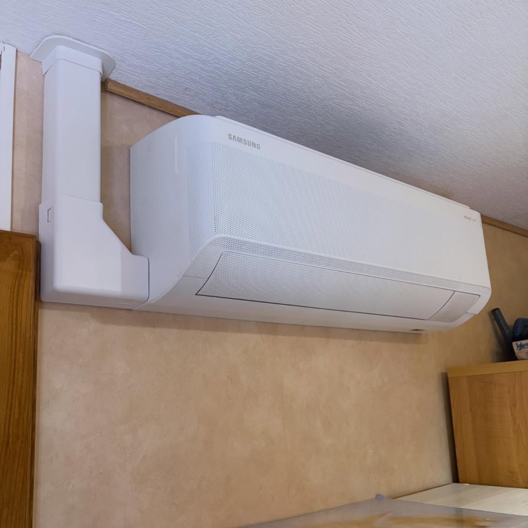 Unité murale SAMSUNG WindFree installée dans une chambre, à Andolsheim